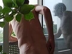 Man Bares All at Window