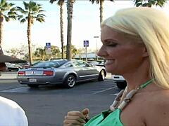 What’s hiding under blonde’s massive boobs?