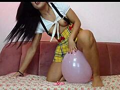 Girl popping balloons with petite brunette latina teen amateur style