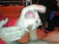 Cheeky handjob caught on sneaky vid