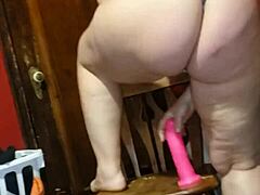 Riding dildo on the kitchen floor