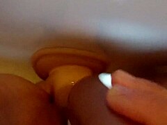 Shower dildo pounding leaves her trembling with need