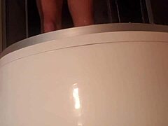 Solo guy stroking cock in steamy shower scene