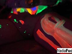 Black-light babes' bold group action.