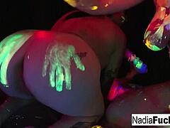Black-light babes' bold group action.