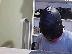 ever seen a gimp sucking strapon like this?