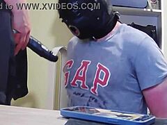 ever seen a gimp sucking strapon like this?