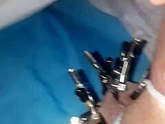 Teasing cock with clamps all over
