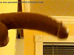 Gay Guy Deepthroats Dildo in Hood