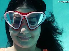 Flexible teen Micha's underwater moves.