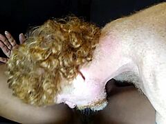 Redhead MILF's Bold Ebony Passion