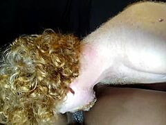 Redhead MILF's Bold Ebony Passion