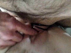 teasing her depths with sensual delight