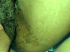 Ebony charm bent over in temptation
