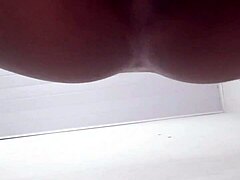 Young brunette teases with solo anal play