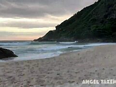angel tempts surfers with beach allure