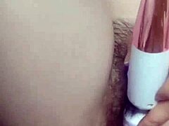 asian babe fingers herself hard and fast