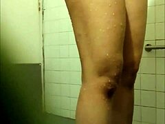Asian wife washes long hair