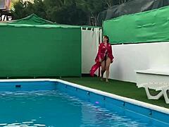 Big-tits brunette’s poolside magic