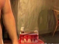 Erotic gay massage unfolds on table