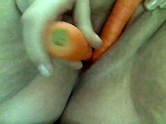 Cheeky BBW teases with carrot in juicy anal play