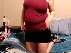 My wife’s solo rub in heels and skirt