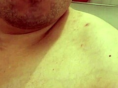 Chubby gay's daring shower ends with cum blast