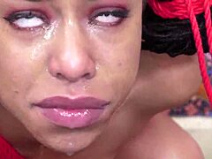 what’s making this teen gag so hard on bound cock?
