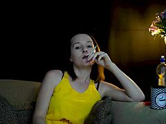 Sucking a cigarette while staring right at you