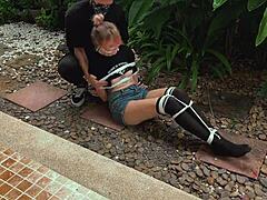 Tied up for pleasure outdoors