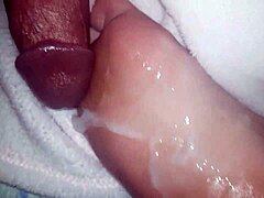 Massive Cumshot on Slick Oiled Feet