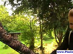 piss babes drench outdoors in golden shower fun