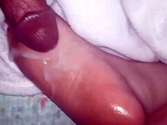 Massive Cumshot on Slick Oiled Feet