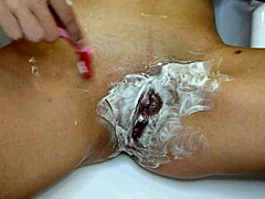 Close-Up POV of Unshaven Pussy Shaving