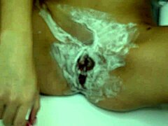 Close-Up POV of Unshaven Pussy Shaving