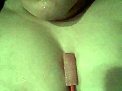 sucking lollipop while teasing my wet boobs