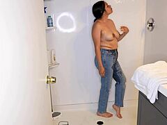 Latina Wets Jeans and Strips in Shower