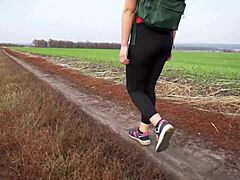 milf teases in tight black leggings on walk