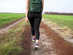 milf teases in tight black leggings on walk