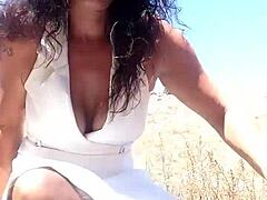 Marilyn Monroe lookalike masturbates outdoors with a dildo