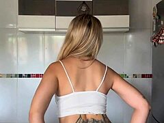 this blonde amateur loves showing off her big ass and pierced nipples while shaking it