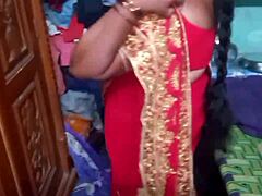 This desi housewife beauty changes her sari at home. Her charm just fills the room with allure!