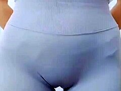Hey, watch this Asian girl groove with a sexy cameltoe on display.