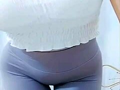 Hey, watch this Asian girl groove with a sexy cameltoe on display.