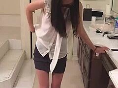 asian teen teases with a slow strip reveal