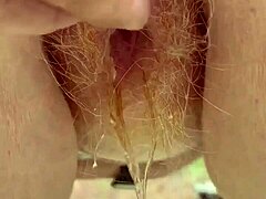 Peeing Through Red Hair with Bold Intensity