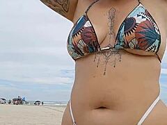 Young African Flashes Tiny Panties at USA Beach to Attract Married Men for Wild Fun