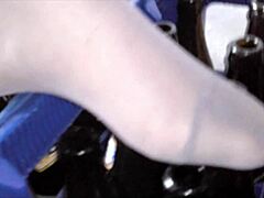 Littleangel26 shows off sexy nylon feet in intriguing display