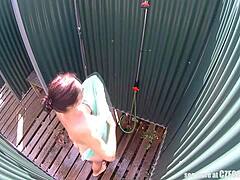 Brunette milf caught showering naked at public pool.