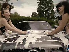 playboy babes in bikinis wash a mercedes amg gt. their big asses shine under the sun.